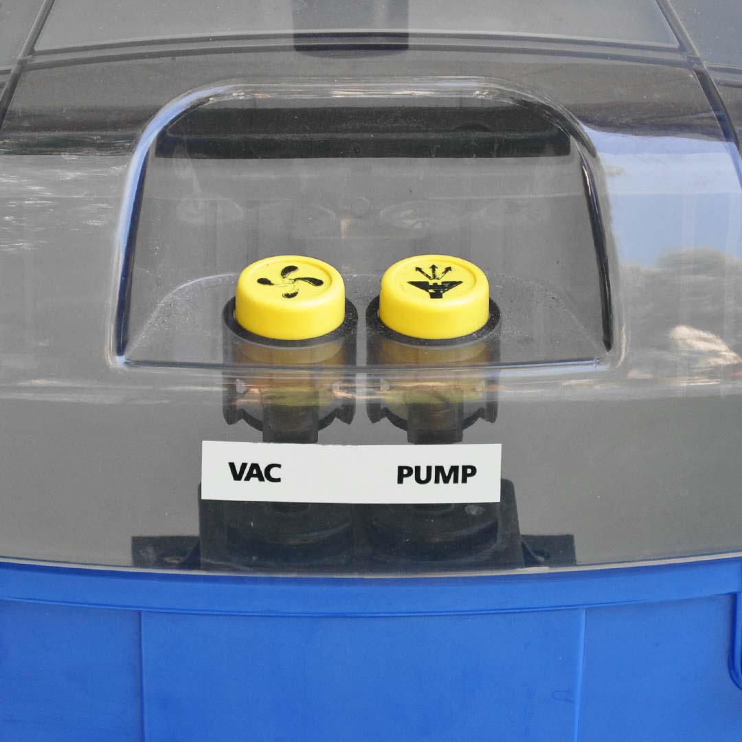 Aqua Pro Vac - Close-up of the control panel with yellow buttons labeled as vac and pump housed in the transparent top lid.